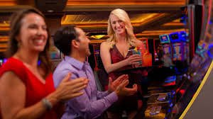 Live dealer blackjack table with professional croupier and real-time betting interface