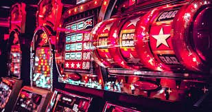 area138 mobile app showing Microgaming slot library and account balance